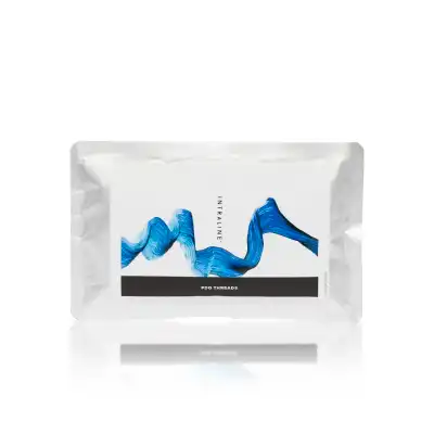 A silver and white packet labeled "INTRALINE® MONO 29G 38 50 6-0" is displayed. The package features a blue abstract wave design in the center. The transparent reflection beneath the packet suggests a glossy surface.