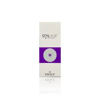 A box of STYLAGE® M BI-SOFT®, a cosmetic product from VIVACY, features a white and purple design. The packaging displays the product name at the top and a large "M" in a purple circle in the center. VIVACY's logo is at the bottom with the text "+ IPN-LIKE TECHNOLOGY" at the top.