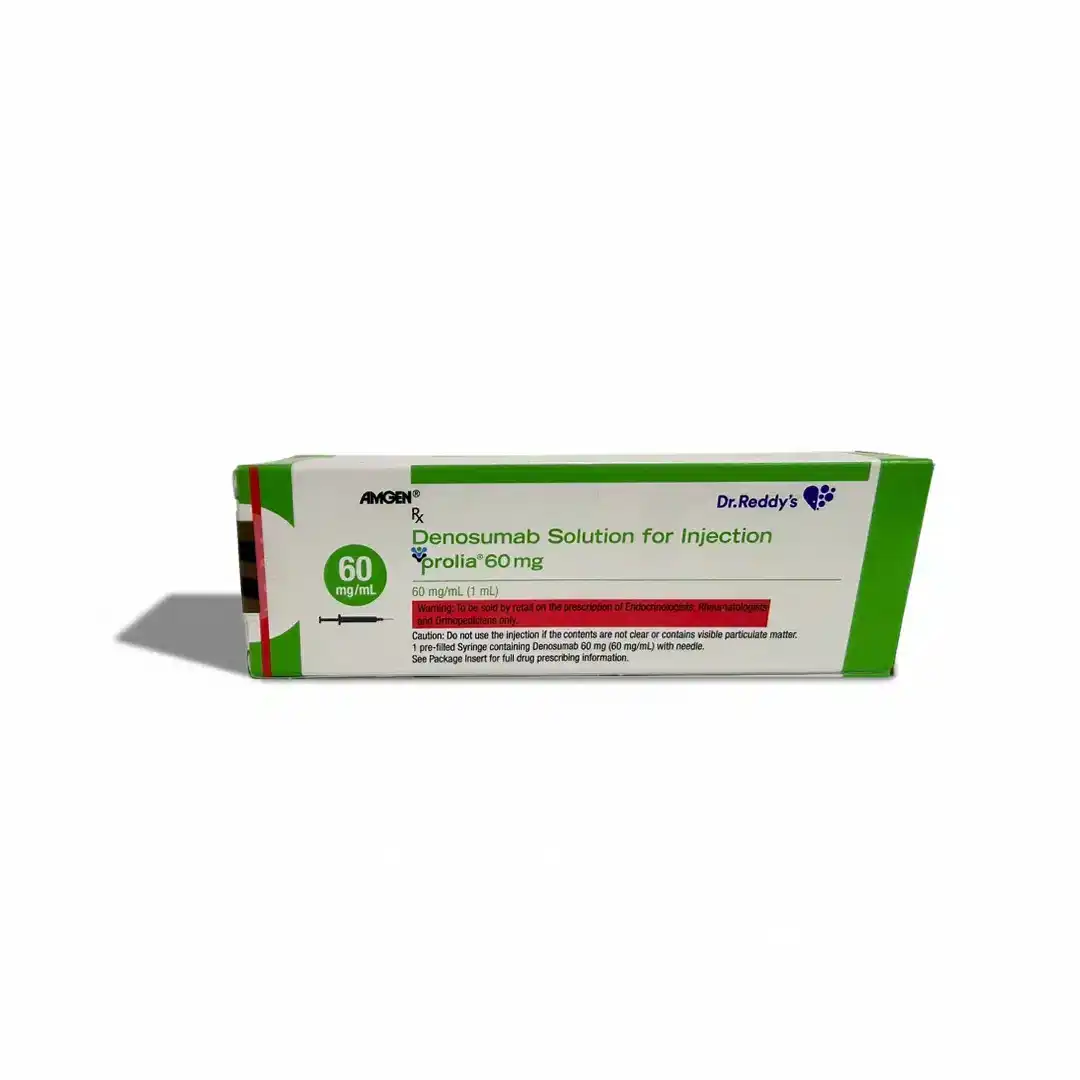 A white and green box of PROLIA® Solution for Injection (60 mg) is shown, displaying dosage details and usage instructions on the packaging.