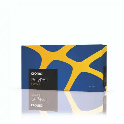 A rectangular box labeled "CROMA PhilArt NEXT" features a modern blue and yellow abstract design, displayed upright with a subtle reflection below. The packaging indicates a 1 x 2 ml content.
