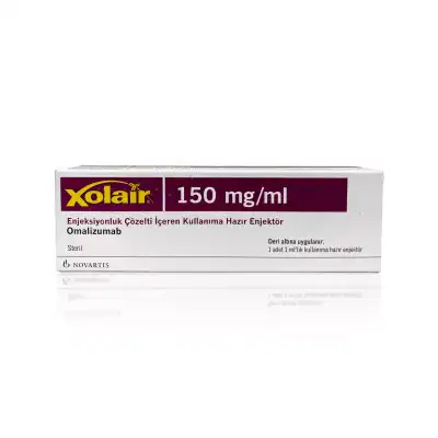 A box of XOLAIR® 150mg medication, labeled "150 mg/ml," intended for injection. The box provides instructions in Turkish, indicating it contains injection solution for subcutaneous use and lists Omalizumab as the active ingredient. The brand name "Novartis" is visible.