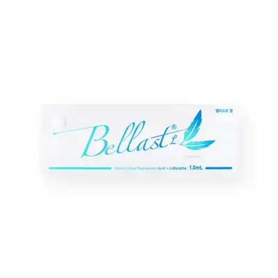 The image shows a white box of BELLAST® L, a product containing cross-linked hyaluronic acid and lidocaine. The front of the box features the brand name "BELLAST® L" in aqua blue script, along with a feather design and the volume of 1.0 mL.