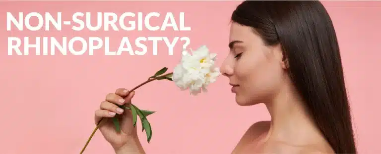 A woman with long brown hair holds and smells a white flower against a pink background. Text on the left reads, "NON-SURGICAL RHINOPLASTY?.