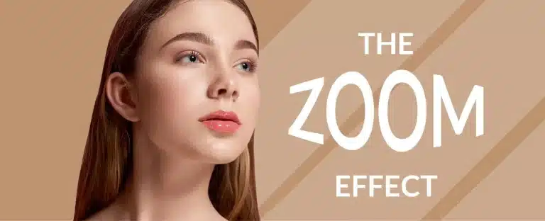 A young woman with long brown hair, natural makeup, and clear skin gazes to the side against a beige geometric background. To the right, the text reads "THE ZOOM EFFECT" in bold, white letters.