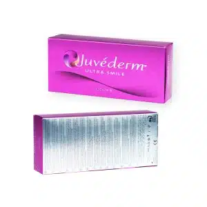 Two views of a pink and silver rectangular box labeled "JUVÉDERM® ULTRA SMILE." The front shows the brand name with a wave design. The back displays detailed product information and usage instructions in small print.