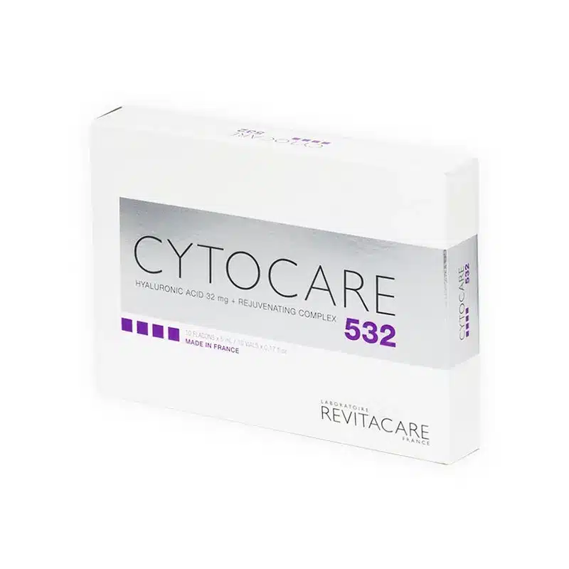 A white box labeled "CYTOCARE 502" with purple accents, indicating it contains hyaluronic acid and a rejuvenating complex. The box also shows it's made by Laboratoire Revitacare in France.