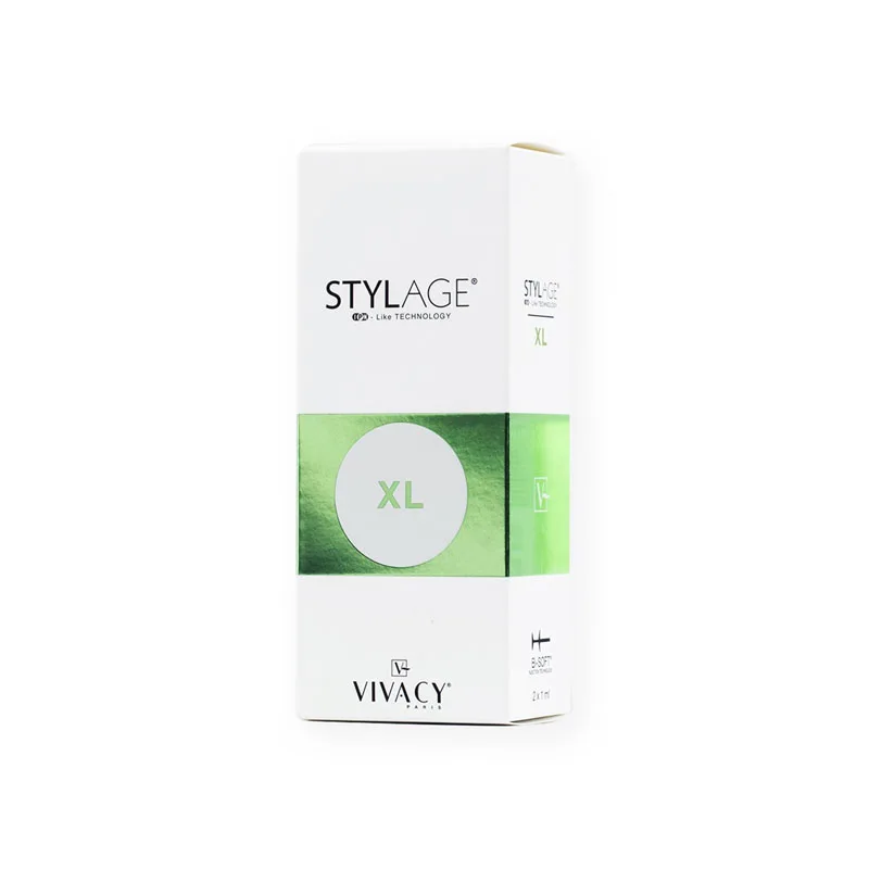 The image shows a white and green rectangular box labeled "STYLAGE® XL BI-SOFT®" with "XL"