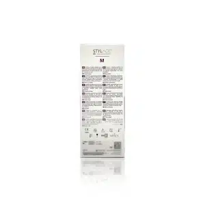 A white box labeled "STYLAGE® M BI-SOFT®" with printed text and symbols, detailing product information and instructions. The box includes sections outlined in purple with numbered bullet points, bullet icons, and a barcode at the bottom.
