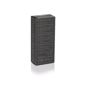 A dark, rectangular product box with text in multiple languages listed on the side. The box is standing on a white surface and reads "REVANESSE® CONTOUR™ with Lidocaine" vertically along the edge. Various symbols and icons are visible at the bottom of the box.