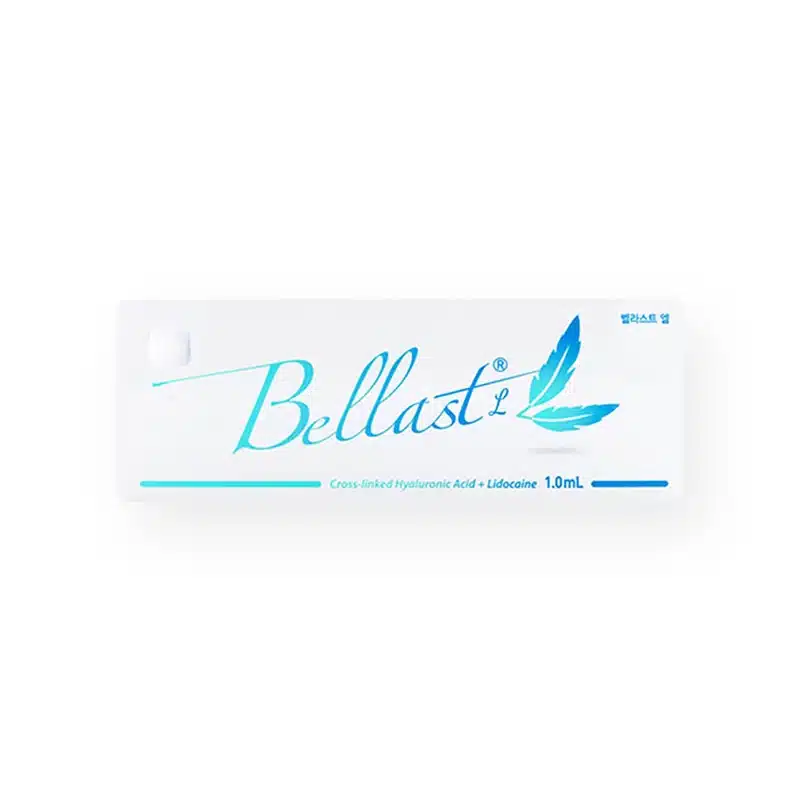 The image shows a white box of BELLAST® L, a product containing cross-linked hyaluronic acid and lidocaine. The front of the box features the brand name "BELLAST® L" in aqua blue script, along with a feather design and the volume of 1.0 mL.
