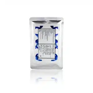 A silver foil packet of INTRALINE® COG C18100M-C Dimension 720 18G 100mm. The front of the packet displays a white label with black text detailing product information, usage instructions, and safety certifications. Blue and white graphics accentuate the label.