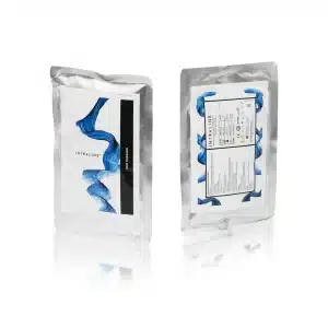 Two silver foil pouches are shown. The front pouch displays abstract blue waves with the text "INTRALINE® MONO 29G 38 50 6-0." The back pouch shows a white label with product information, including text in various languages and a barcode. Both pouches have a reflective surface.