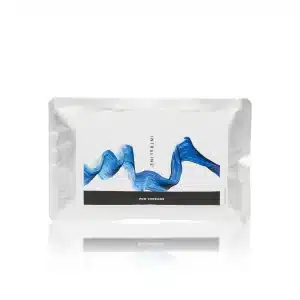 A silver and white packet labeled "INTRALINE® MONO 29G 38 50 6-0" is displayed. The package features a blue abstract wave design in the center. The transparent reflection beneath the packet suggests a glossy surface.