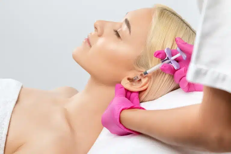 woman getting earlobe filler