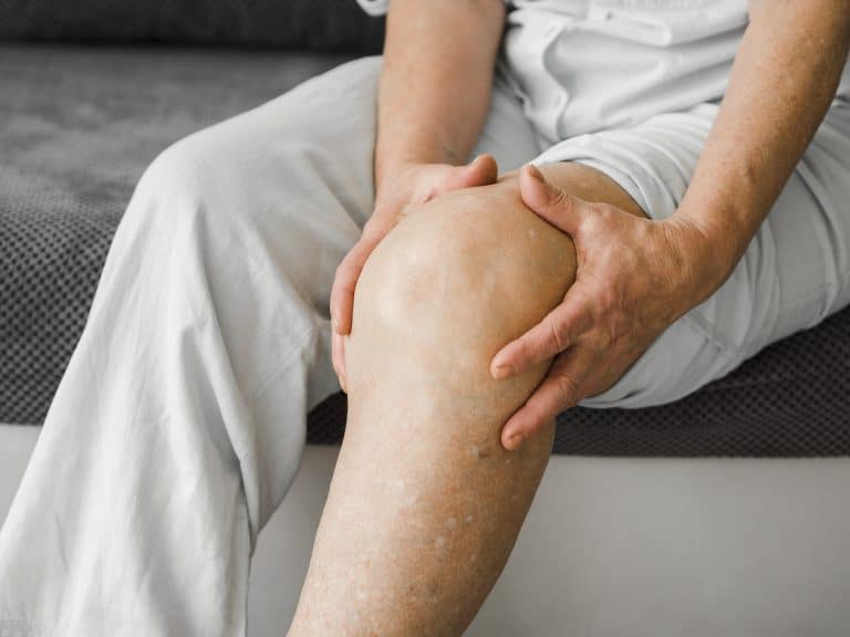 old patient suffering from knee pain