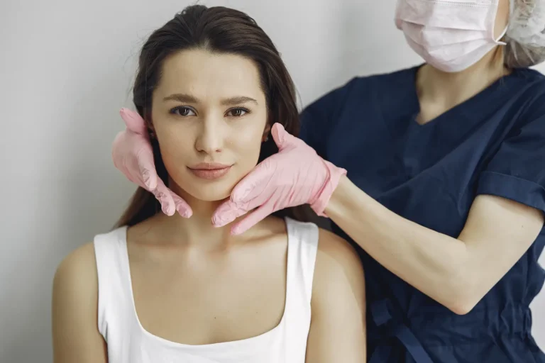 A healthcare professional prepares a patient for mesotherapy treatment.