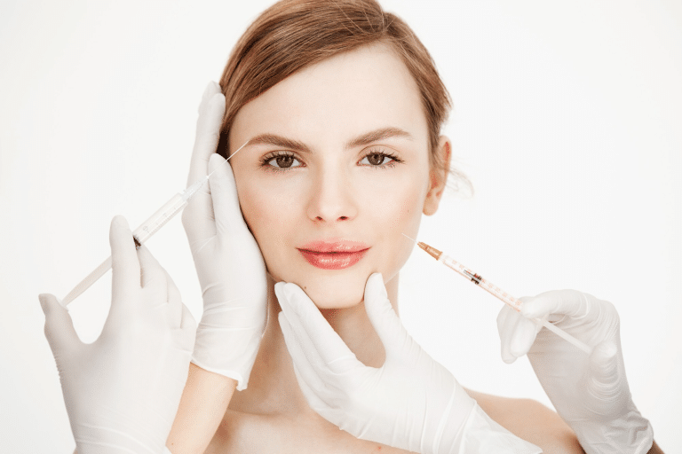 Woman getting facial injections.