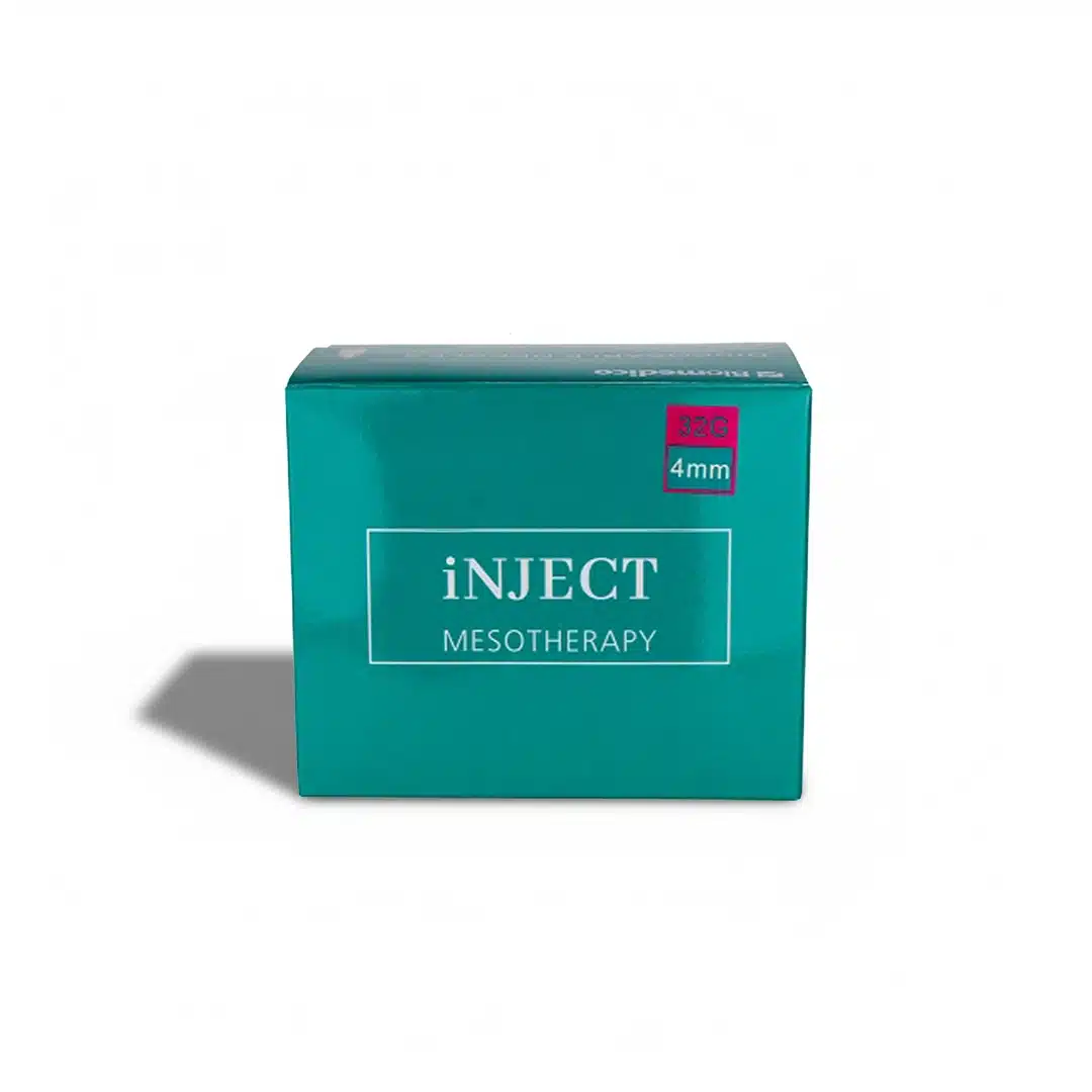A teal box labeled "BIOMEDICO 32G - 4mm" has a small pink sticker in the top right corner showing