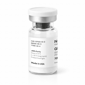 A clear vial with a white label and silver cap contains a white powder. The label displays the product name “GLOW BPC 157 10mg + GHK-CU 50mg + TB500 10mg,” chemical information, storage instructions, and states “Made in USA.”.