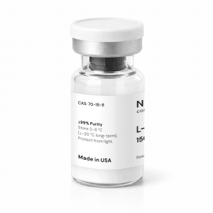 A clear vial with a silver cap and white label showing chemical purity, storage instructions, and “Made in USA” text. The vial contains a white powder or substance.