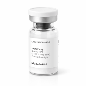 A clear glass vial with a silver cap and a white label displaying storage instructions, purity information, and “Made in USA.” The vial contains a white powdery substance.