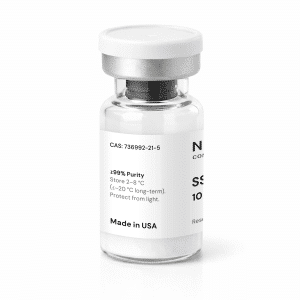 A clear vial with a white cap containing white powder. The label reads “≥99% Purity,” includes storage instructions, a CAS number, and “Made in USA.” The rest of the text is partially visible.