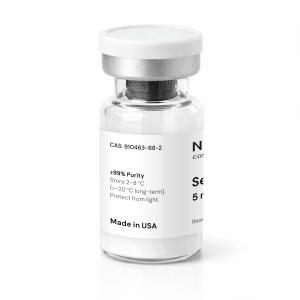 A clear glass vial with a white label and cap, containing a white powder. The label reads “Semaglutide 5mg,” “≥99% Purity,” storage instructions, and “Made in USA.” The vial is photographed on a white background.