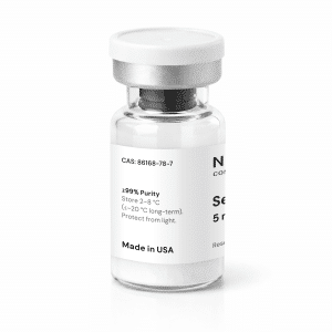 A clear vial labeled “Sermorelin 5mg” with a white label displaying chemical information such as purity, storage instructions, and “Made in USA.” The vial has a silver cap and contains a white substance.